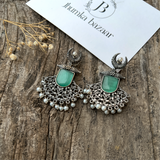 Silver Replica Oxidized Half Moon Dangler Earrings with Unique Pearl & Floral Art - Mint